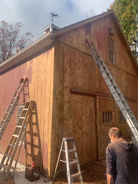 Barn staining and exterior coating in progress near Hudson, NY